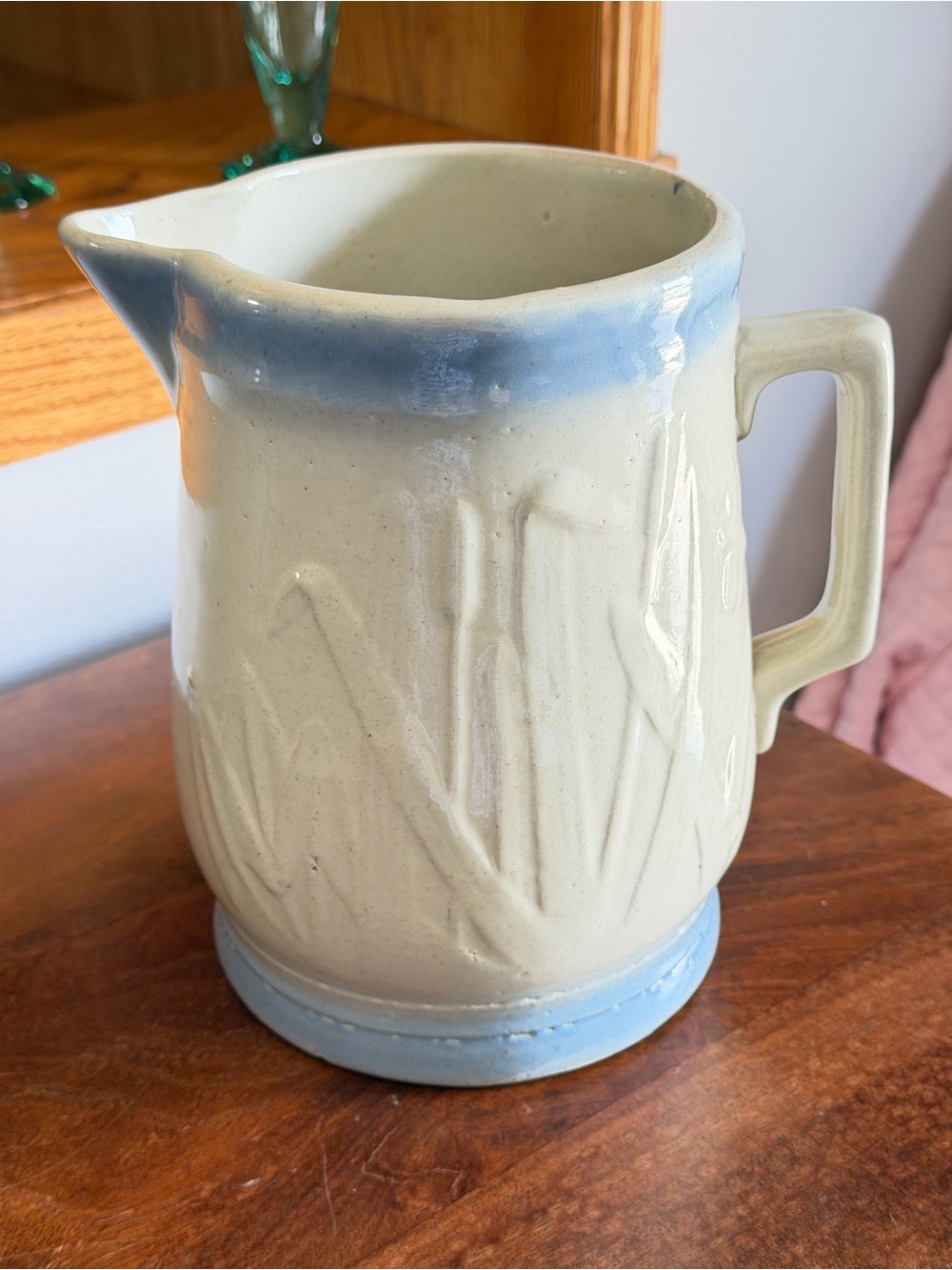 Antique Ceramic Pitcher with Soft Blue Rim and Base
